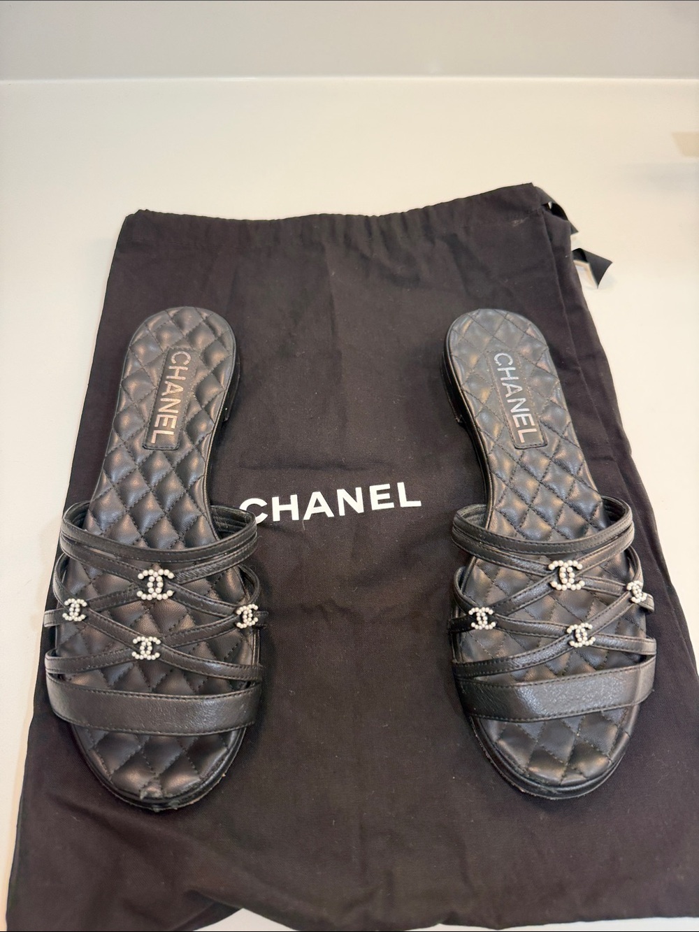CHANEL Black Quilted Leather Slide Sandals with Crystal CC Embellishments